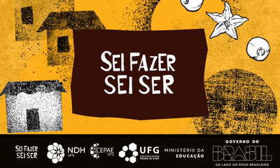 banner_noticia_sei_fazer_sei_ser
#ParaTodosVerem
Banner horizontal com fundo majoritariamente amarelo-alaranjado, texturizado com pequenos pontos e manchas pretas que remetem à técnica de xilogravura.
No centro, há uma forma geométrica irregular em marrom-escuro, assemelhando-se a uma bandeira ou um bloco de recorte. Dentro dela, está escrito em letras brancas de fôrma estilizadas, dispostas em duas linhas: "SEI FAZER" e "SEI SER".