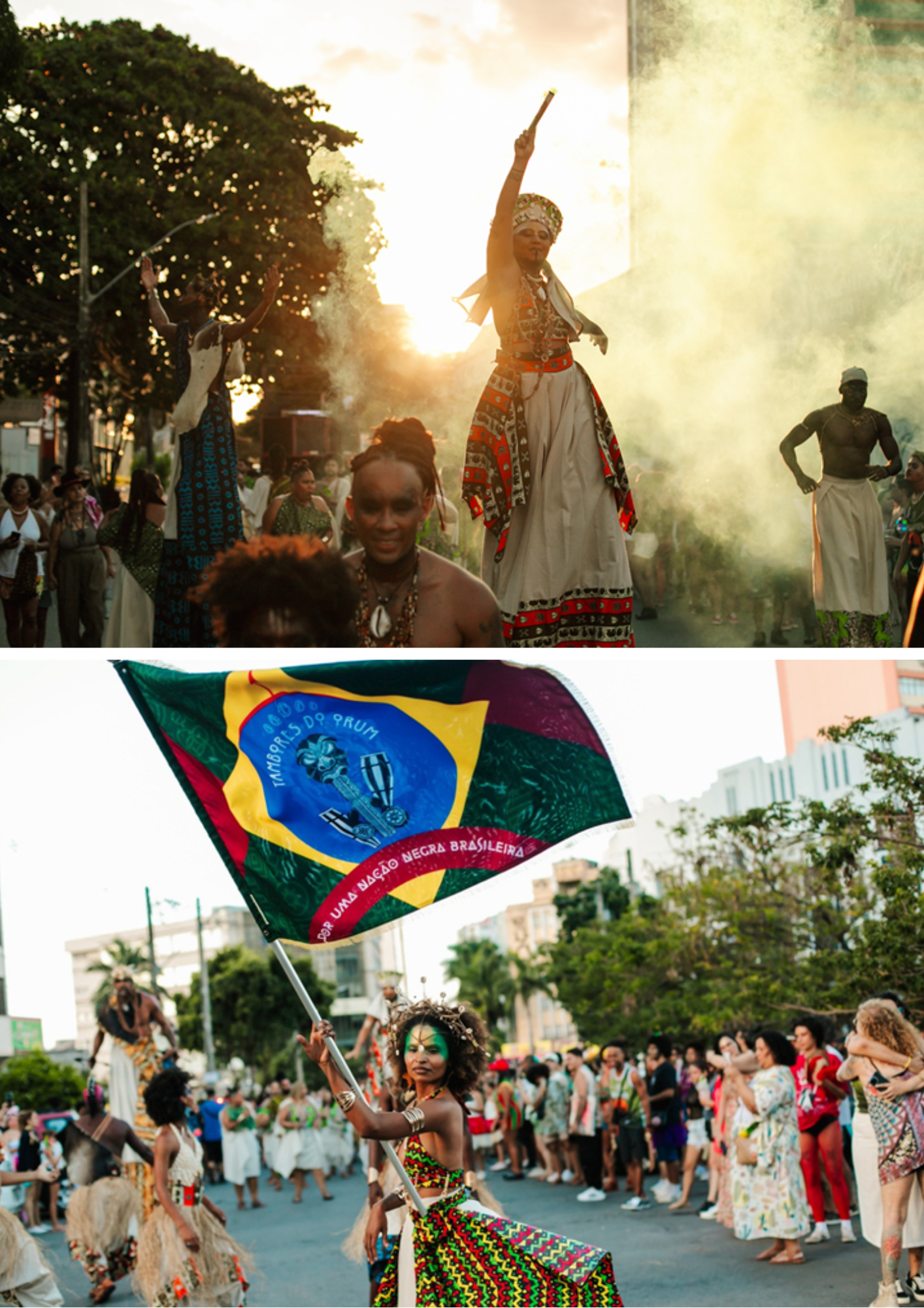 Montagem com duas fotografias de uma manifestação cultural em espaço público. Na imagem superior, artistas em trajes tradicionais participam de um cortejo ao ar livre, com fumaça, luz do pôr do sol e pessoas ao redor acompanhando a apresentação. Uma das artistas aparece em destaque sobre pernas de pau, segurando um objeto erguido. Na imagem inferior, uma participante segura uma grande bandeira colorida com os dizeres “Tambores do Orum” e “Por uma nação negra brasileira”, enquanto outras pessoas seguem em cortejo pela rua. A imagem registra uma celebração cultural afro-brasileira, marcada por dança, música, ancestralidade e ocupação coletiva do espaço urbano.