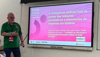 Imagem mostra professor alfredo costa em apresentação de trabalho do Nodus no Ibercom, em Braga, Portugal