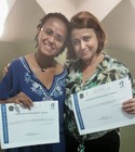 Professoras da FIC, Luciene Dias e Eliany Alvarenga, recebem homenagem na ultima reunião anual de 2015 do CONSUNI/UFG.