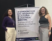 Servidoras do CIDARQ em apresentação de trabalho