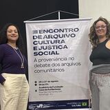 Servidoras do CIDARQ em apresentação de trabalho
